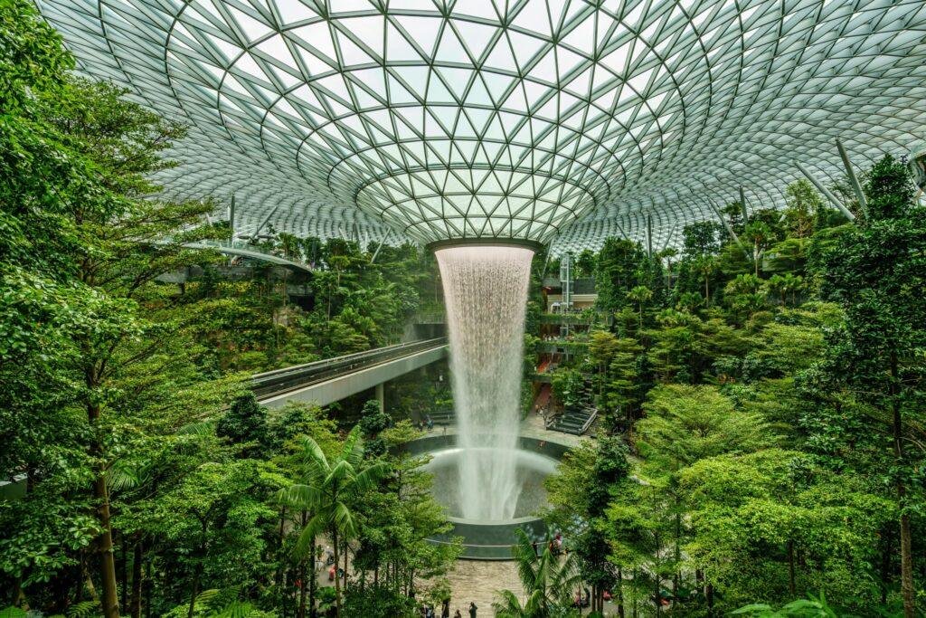 Cloud Forest indoor waterfall and lush tropical plants at Gardens by the Bay, Singapore