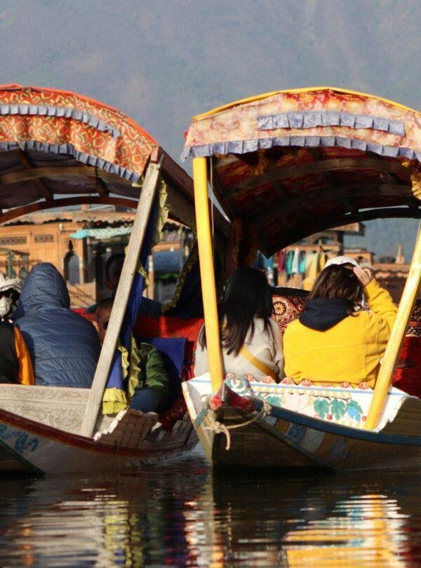 Sunset Shikara ride on Dal Lake with golden sky reflections, Srinagar, Kashmir honeymoon experience