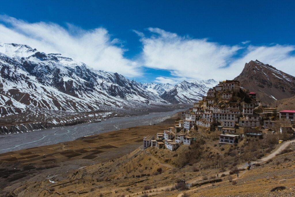 Frozen Nako Lake in Spiti Valley with ice surface and Himalayan mountains India