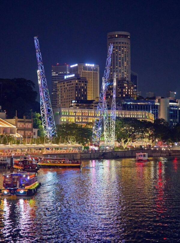 Luxury Singapore cruise ship sailing with skyline views and ocean backdrop