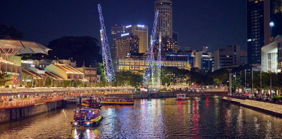 Luxury Singapore cruise ship sailing with skyline views and ocean backdrop