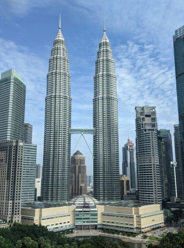 Petronas Twin Towers illuminated against the Kuala Lumpur skyline in Malaysia
