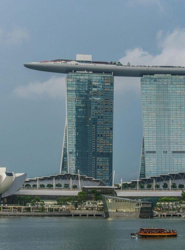 Singapore cruise vacation package with flights included and cruise ship at sea