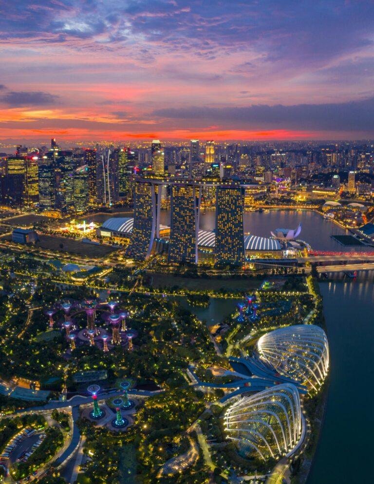 Singapore holiday packages promotional graphic featuring iconic city attractions