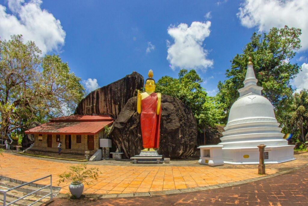 Ancient temple and lush hills on a Sri Lanka cultural scenic tour
