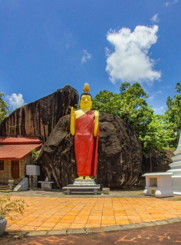 Ancient temple and lush hills on a Sri Lanka cultural scenic tour